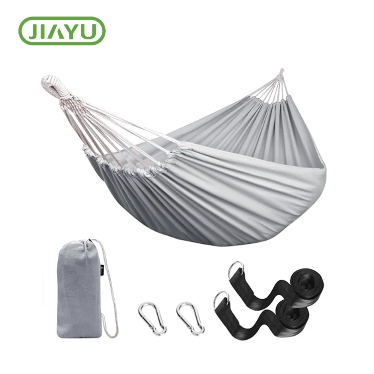 Tasi le tagata i fafo atu o le ie hammock